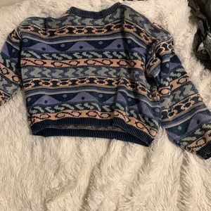 Changes pastel colored sweater. Women’s Size M.